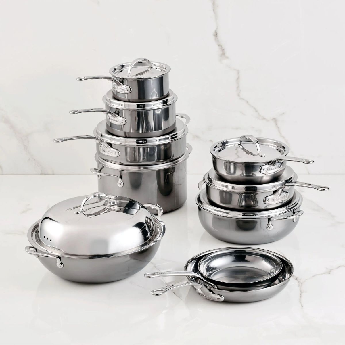 IMG: 18-Piece Titanium Cookware Set with Dutch Oven on marble countertop
