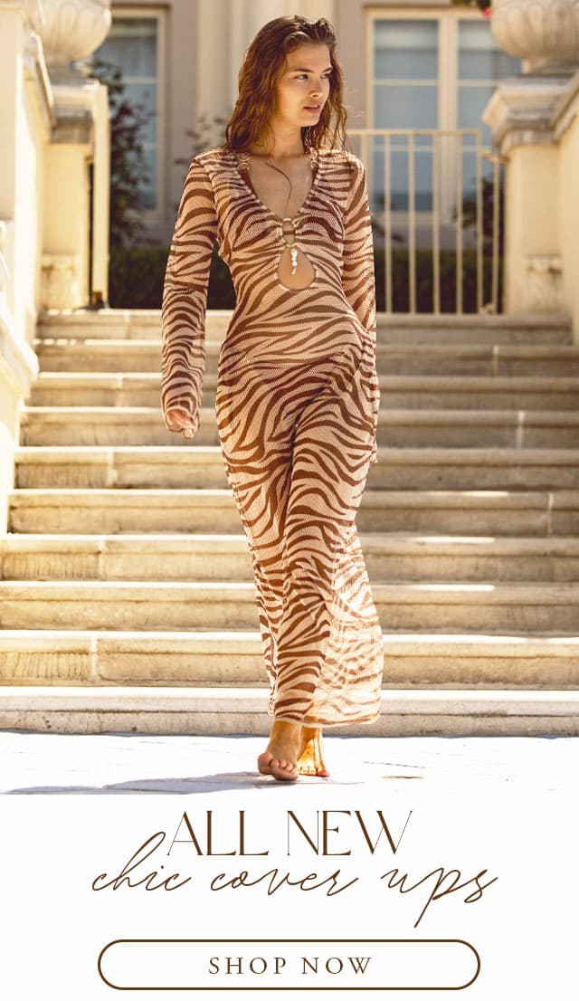 All new chic cover ups. Model wearing tiger print maxi dress. Shop now. 