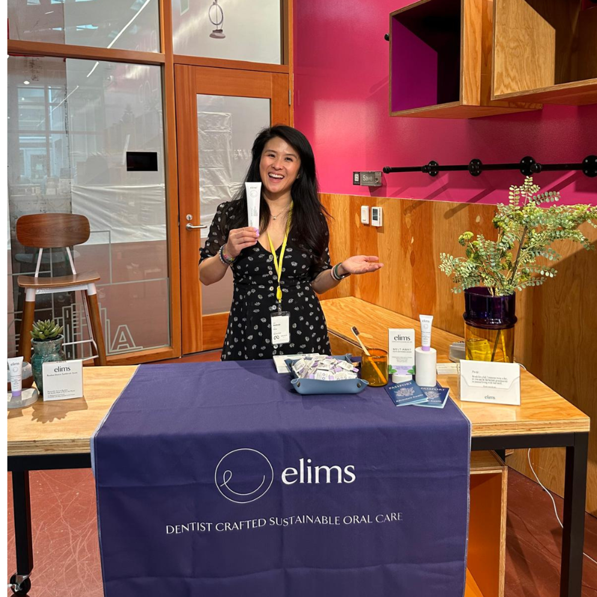 ELIMS co-founder Belinda Lau holding ELIMS toothpaste