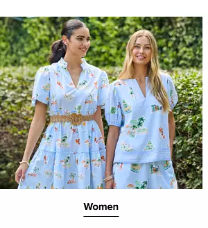 Two woman in printed outfits. Women.