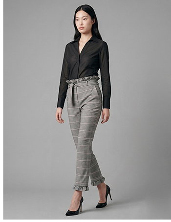 Paperbag waist trousers with removable ruffles at the ankle