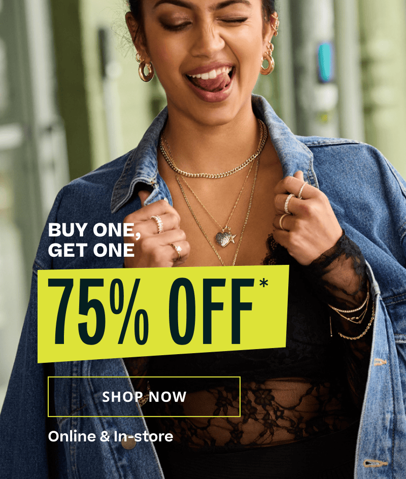 Model wearing thick gold layers with pendants. BOGO 75% OFF. Online & in-store. Click here to shop now