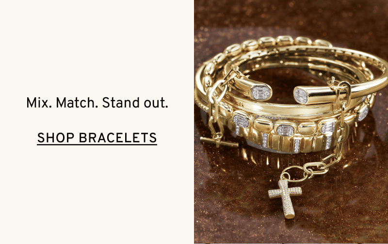 Bangles and bracelets in pile. Mix. Match. Stand out. Click to Shop Bracelets