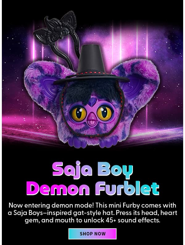 Headline: Saja Boy Demon Furblet   Subtext: Now entering demon mode! This mini Furby comes with a Saja Boys–inspired gat-style hat. Press its head, heart gem, and mouth to unlock 45+ sound effects. SHOP NOW 