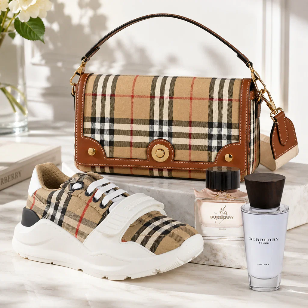 Burberry Classic Elegance collection featuring plaid handbag, matching sneaker, and signature fragrances on marble surface.