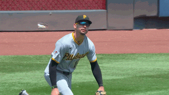 An animated gif of Bryan Reynolds reaching out to make a diving catch