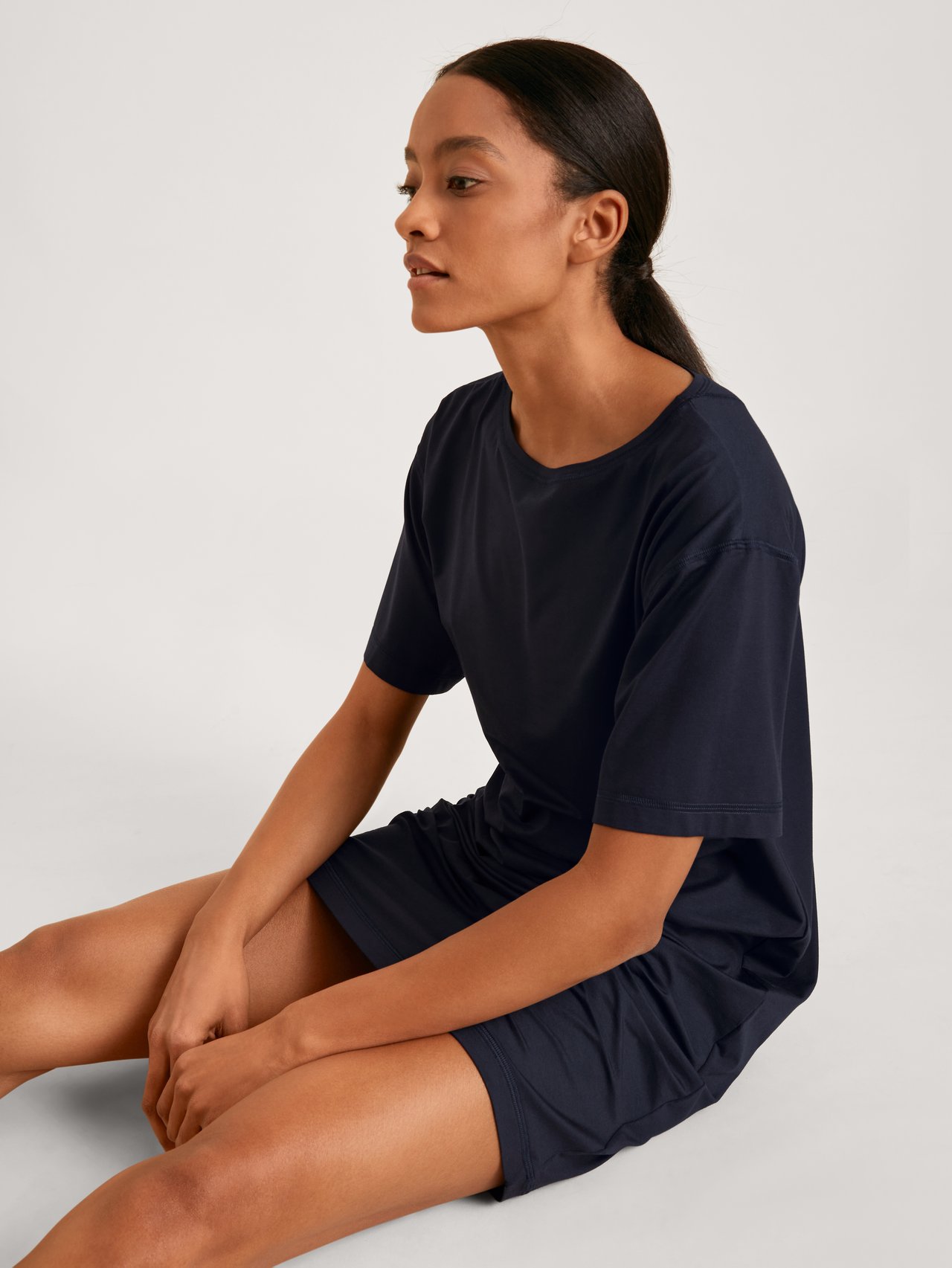 Women model is wearing Nightdress made of Modal in Blue, Unicoloured from the DSW Balancing series by CALIDA, Front view