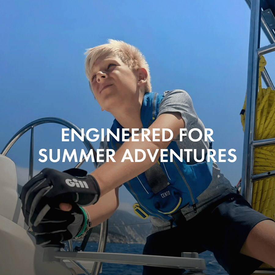 Junior steering a boat wear deckhand gloves 