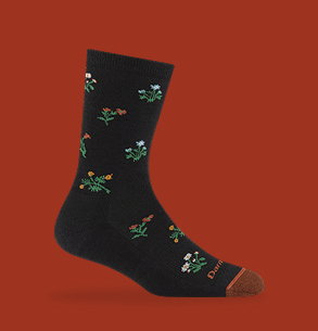 Shop Patterns - a navy floral sock on a cranberry red background