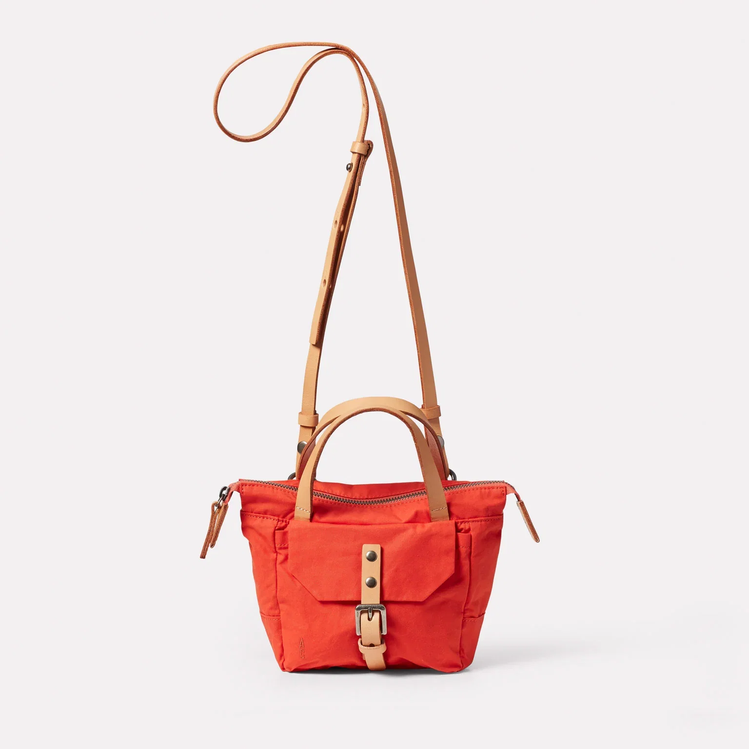 Image of Squat 2.0 Waxed Cotton Mini Crossbody Bag in Lava