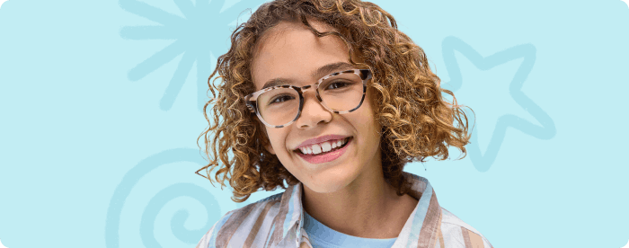 Kid smiling with glasses on