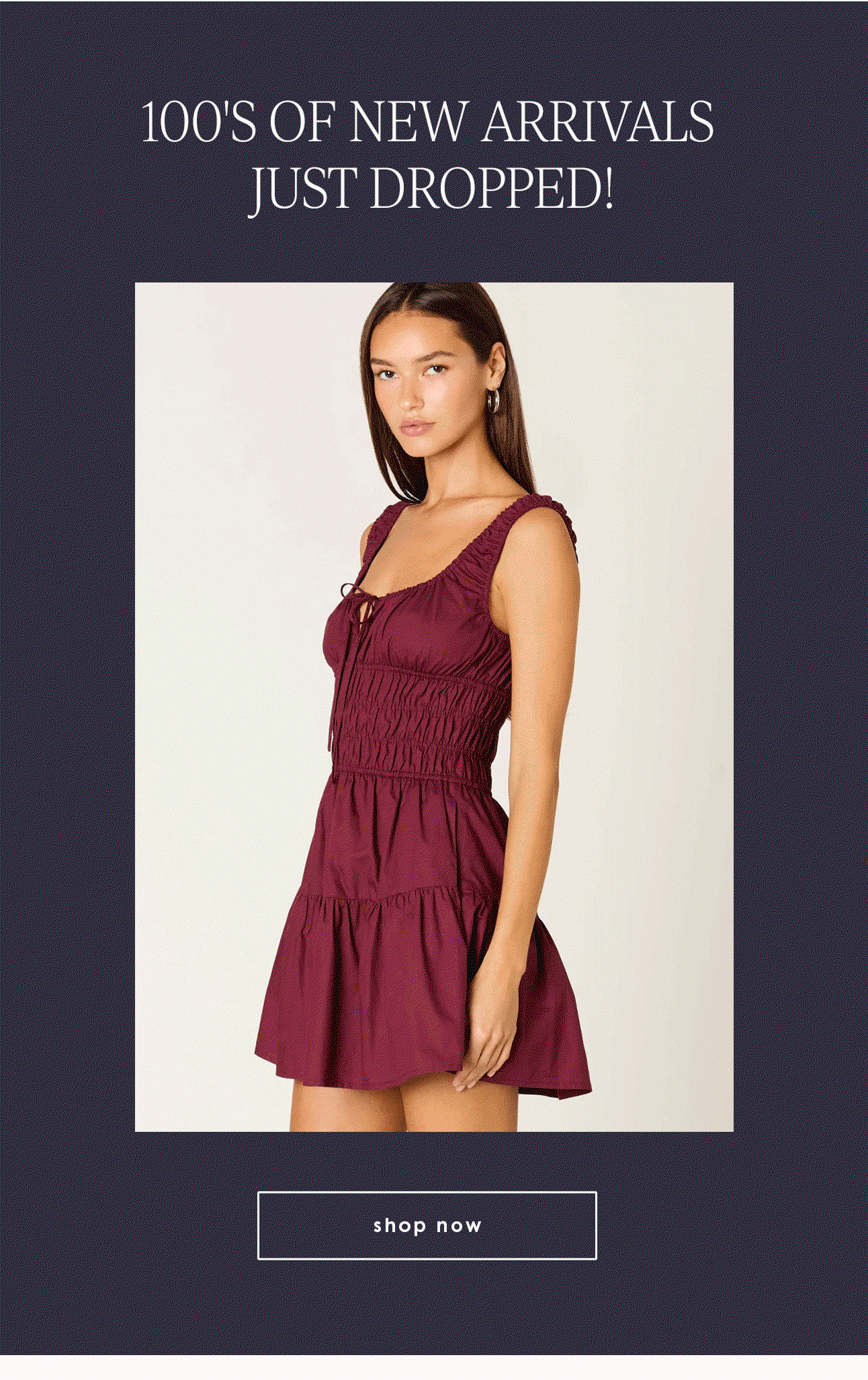 Email graphic announcing “100’s of new arrivals just dropped,” featuring a model in a burgundy mini dress and a “Shop Now” button.