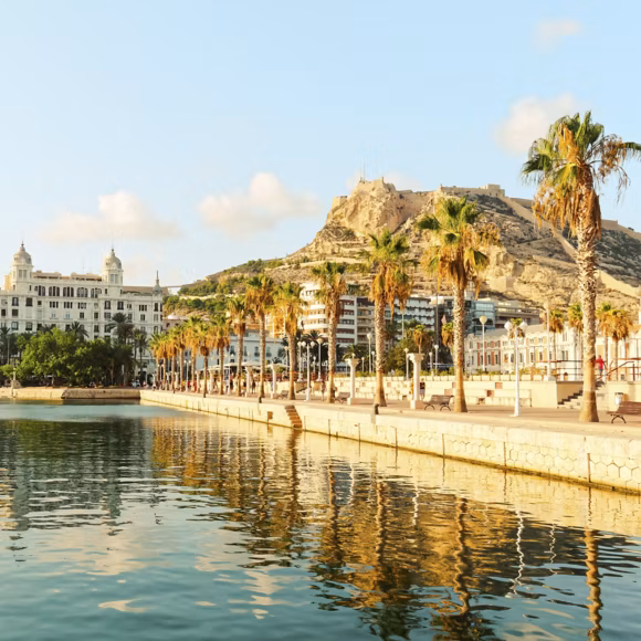 Promenade with palm trees in Alicante. Linking to ba.com.