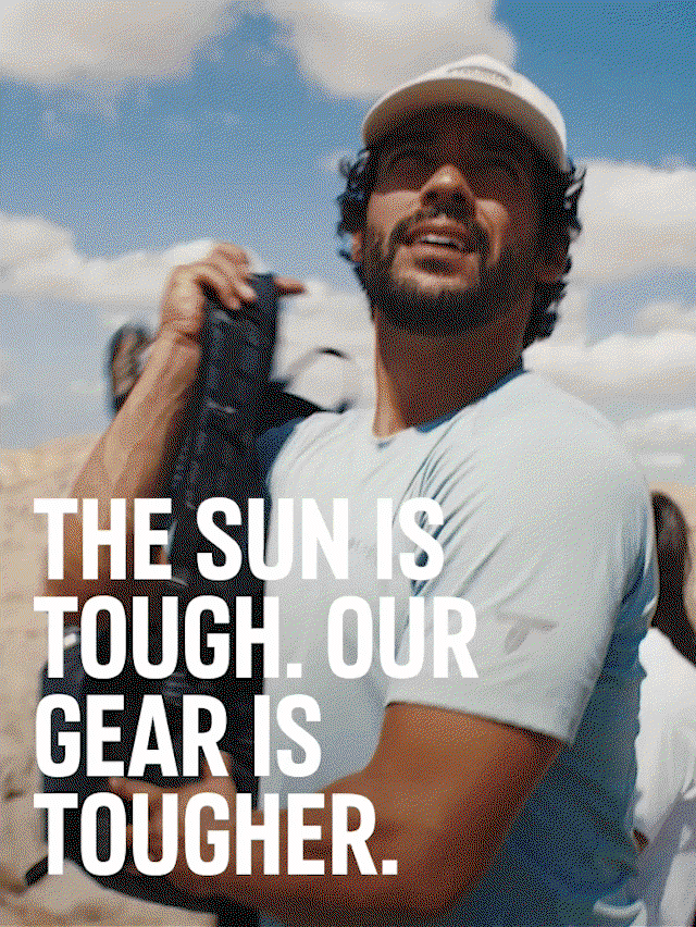 Gif of man and woman hiking and climbing in an arid environment.