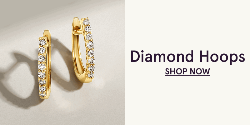 Gold hoop earrings lined with diamonds. Diamond hoops. Click here to shop now