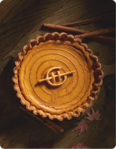 PUMPKIN PIE WITH THE GLASSHOUSE LOGO ON IT