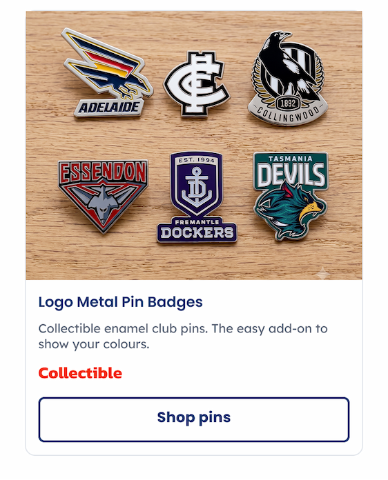A group of AFL Team Logo Metal Pin Badges Sitting on a table