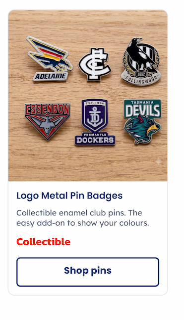 A group of AFL Team Logo Metal Pin Badges Sitting on a table