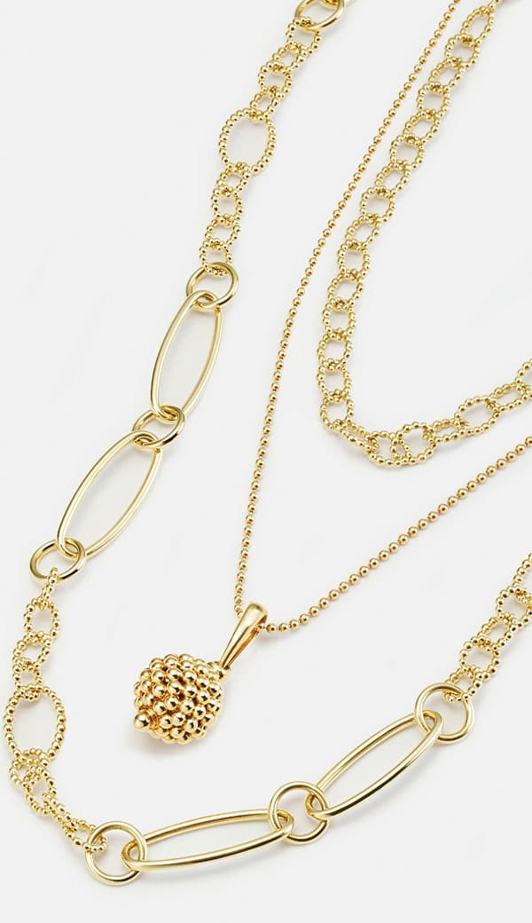 Layers of gold necklaces