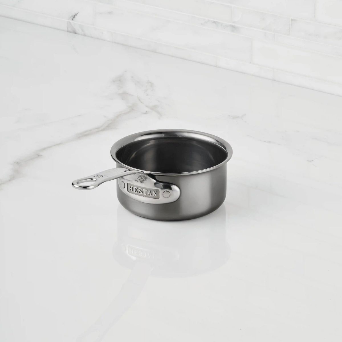 IMG: Titanium Butter Warmer, .75 qt on marble countertop