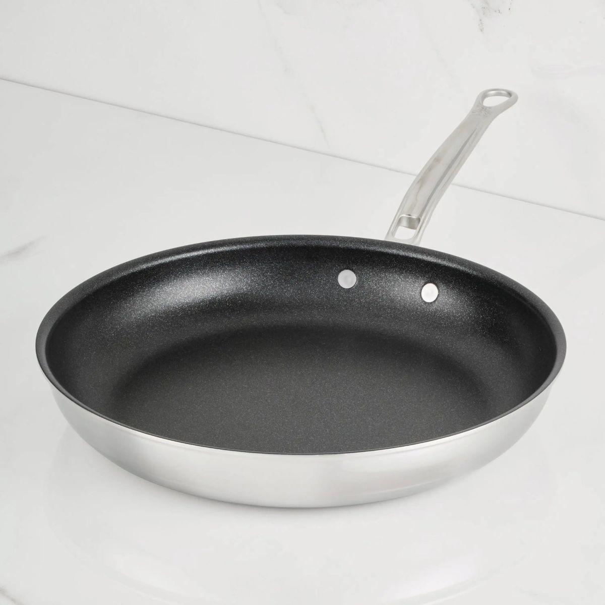 IMG: 12.5" TITUM® Nonstick Skillet on marble countertop