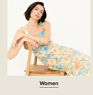 A woman in a floral dress. Shop women.