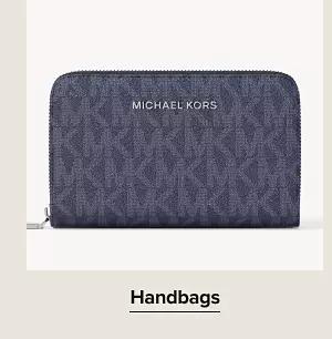 A clutch. Shop handbags.