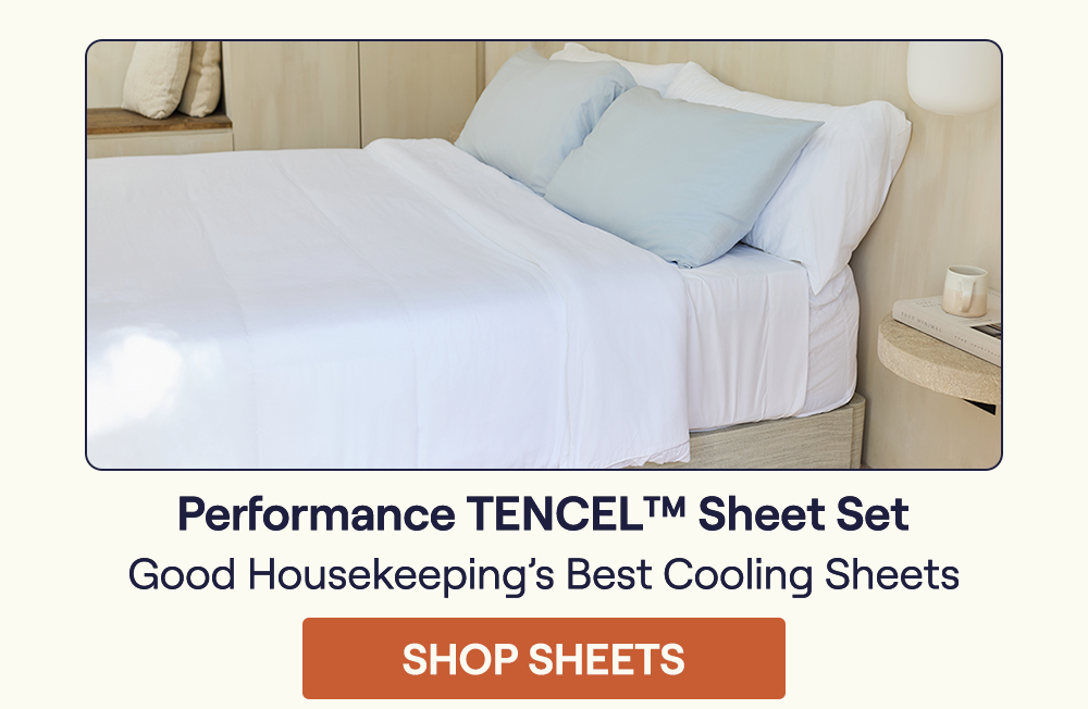 A bed with the white set of the Performance TENCEL™ Sheets and duvet cover