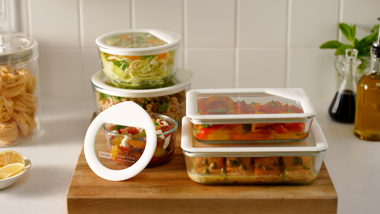 pyrex food storage in a kitchen scene with food in containers