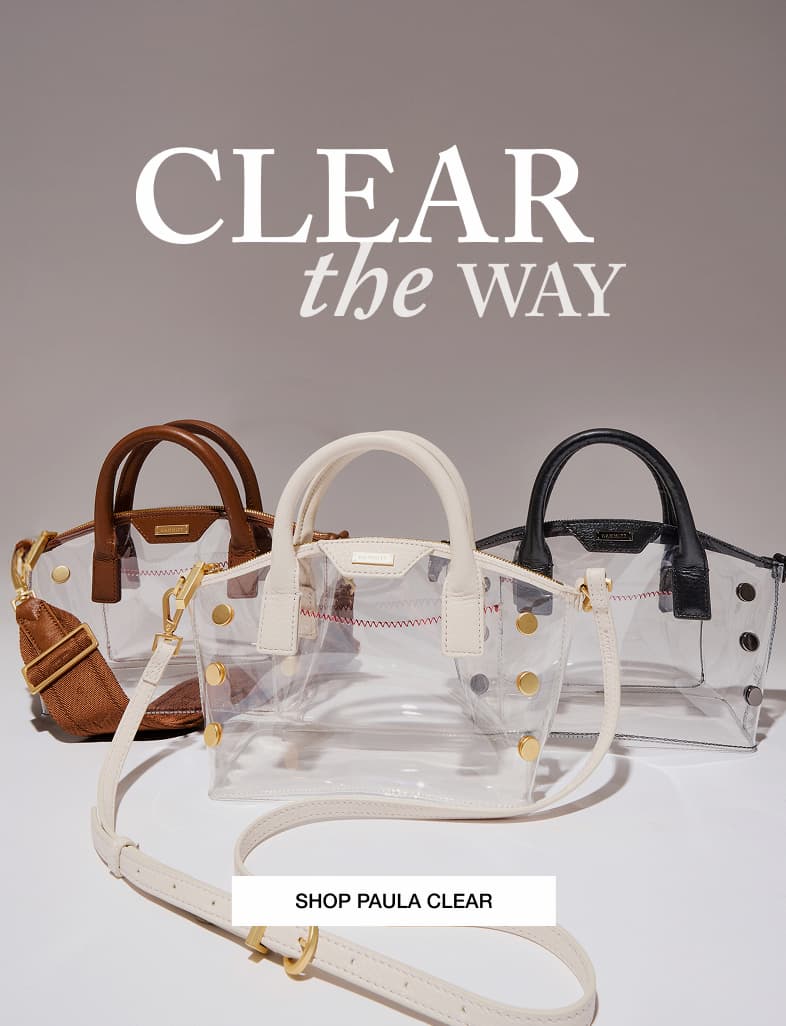 Three Hammitt Paula Clear bags displayed with Mahogany, Calla Lily White, and Black leather trim, showcasing the collection of stadium-approved clear handbags with premium leather accents.