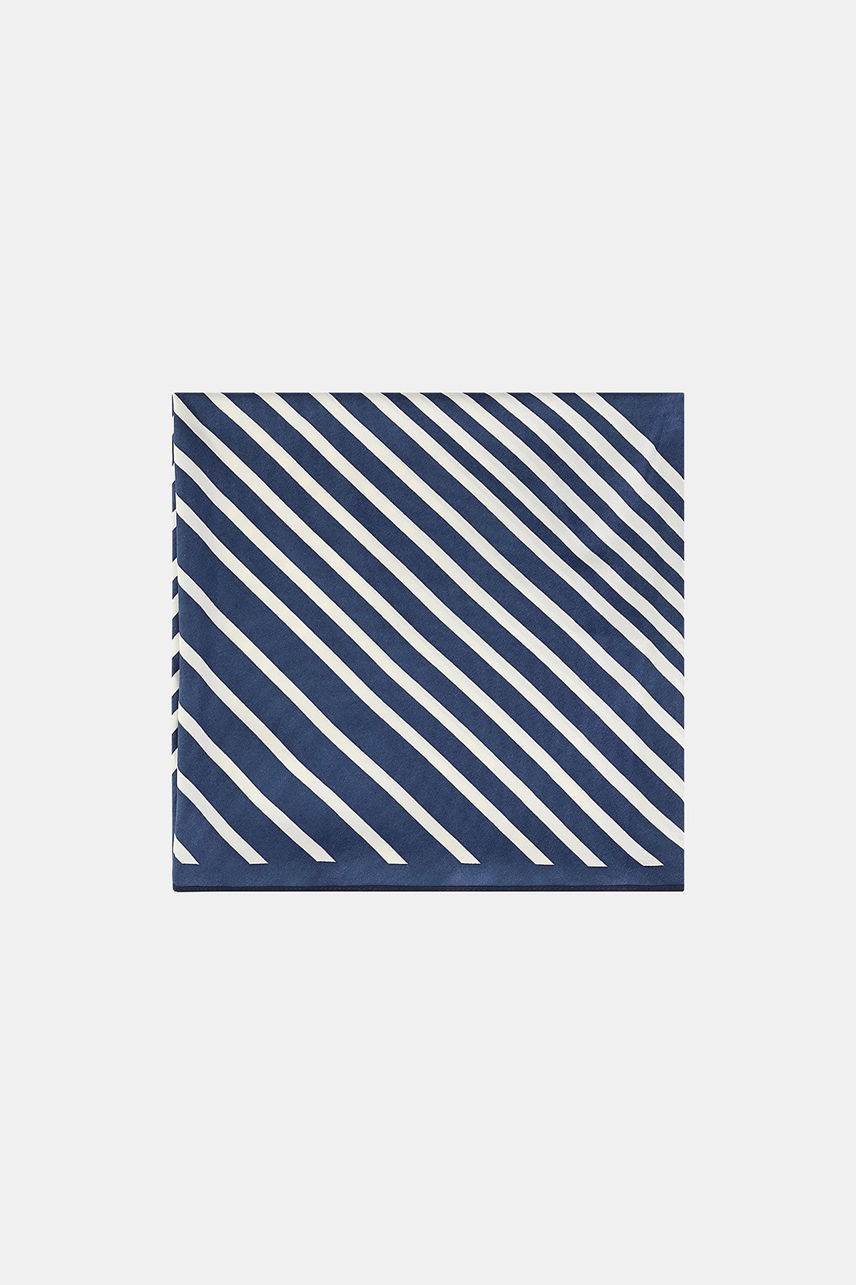 Navy silk pocket square with diagonal white stripes, square fold menswear accessory
