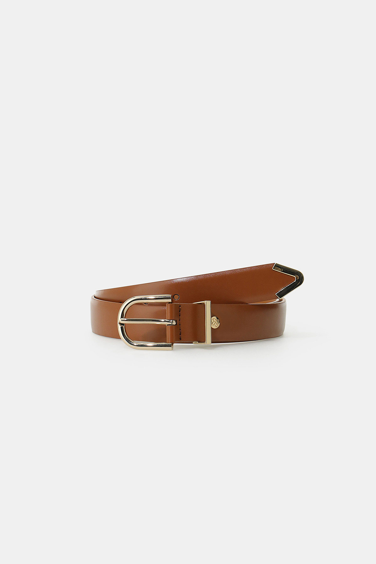 Tan leather belt with gold metal buckle, neatly rolled on white background, classic fashion accessory