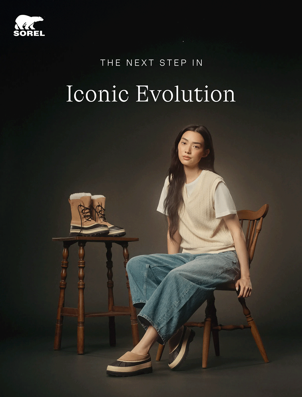 The next step in iconic evolution - Ambler™ Waterproof Clog on model next to Caribou boot
