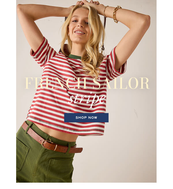 French Sailor Stripe - Shop now - Image of a woman wearing a red striped short sleeve tee.