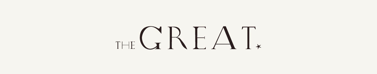 The words "THE GREAT" displayed in elegant black serif typography on an off-white background, with "THE" in smaller uppercase letters positioned to the left of the larger word "GREAT," followed by a small star symbol.