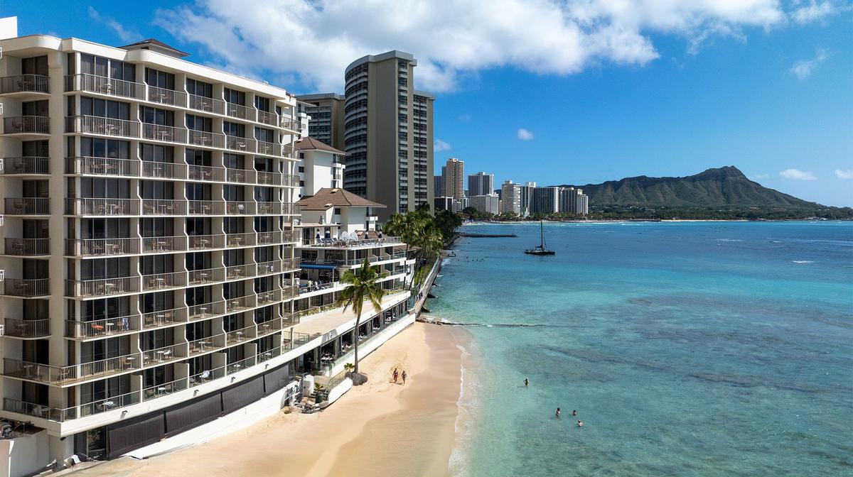 Hawaii Icon: Waikiki Beachfront Escape with Daily Breakfast, Cocktails & Club Upgrades Available