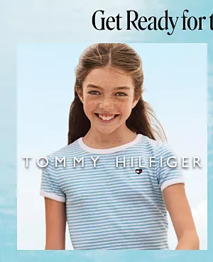 Get ready for the family trip. Shop Tommy Hilfiger. Girl in striped shirt. 