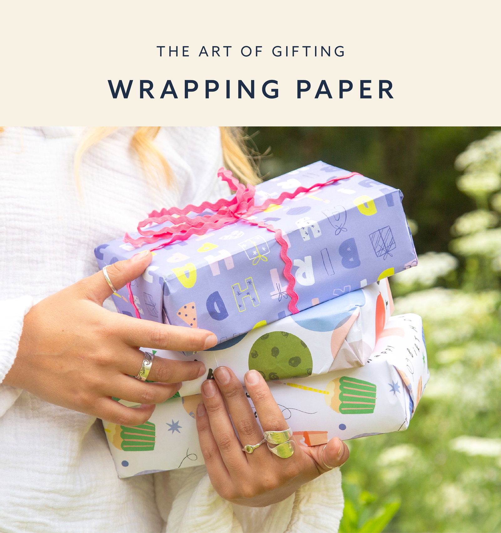 Three beautifully wrapped gifts in colourful Whistlefish wrapping paper, tied with bright ribbon. Shop our gift wrap collection.