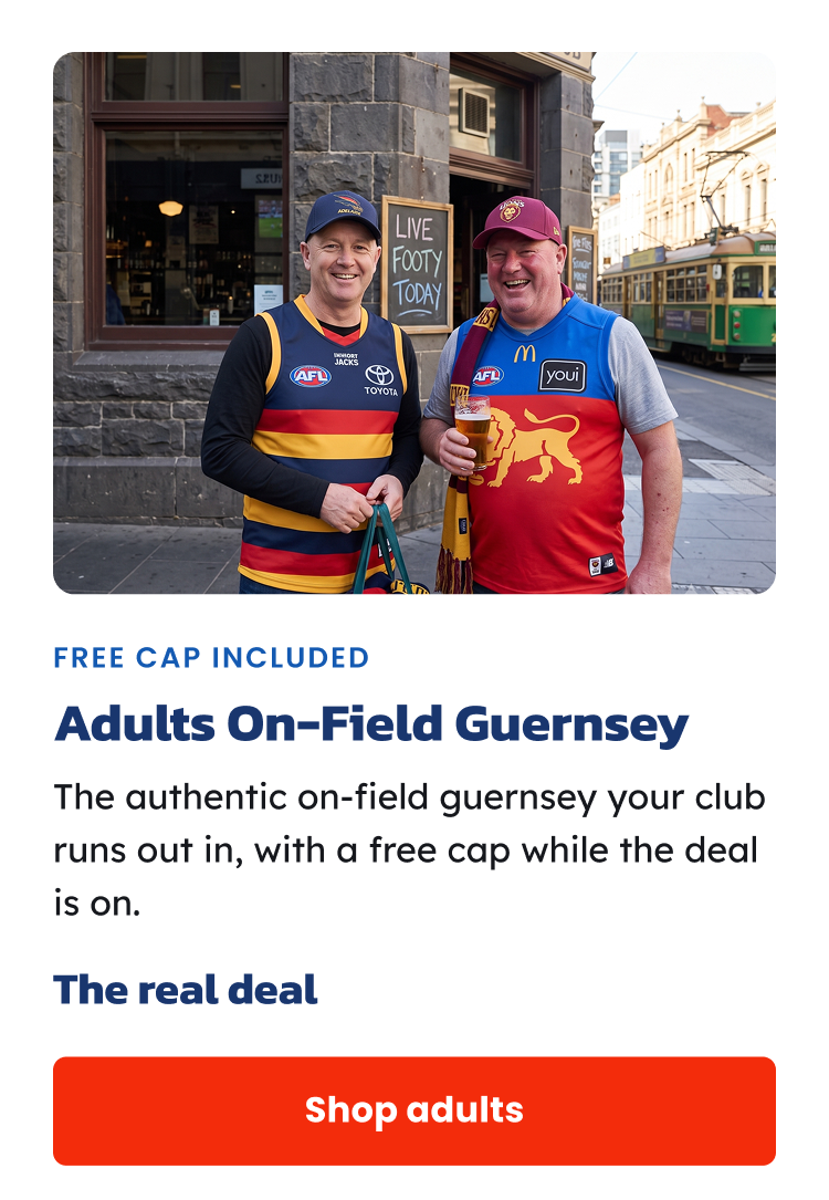 Two men outside a pub wearing AFL guernseys and caps