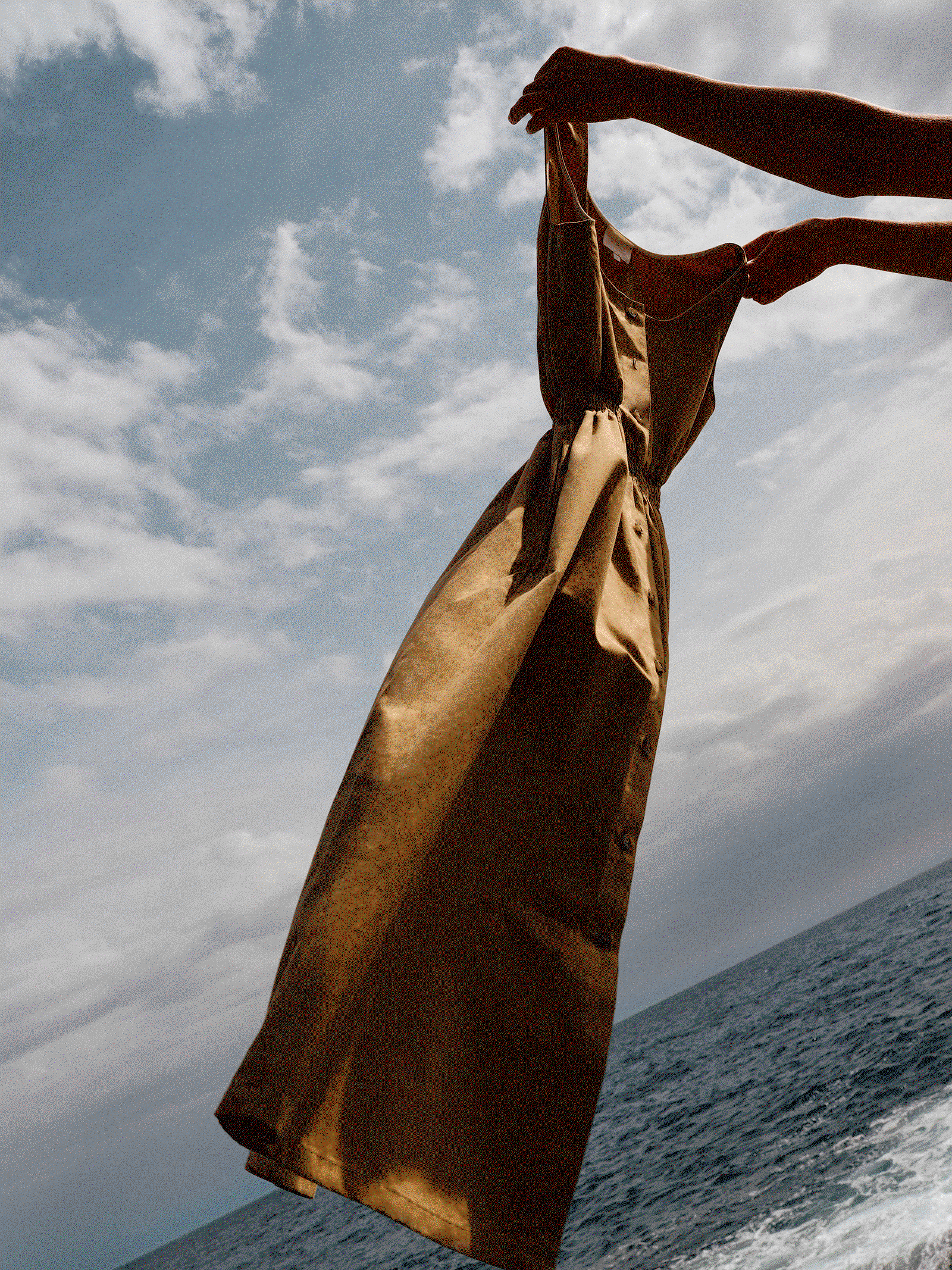 A.P.C.gif of light clothing in a summer setting