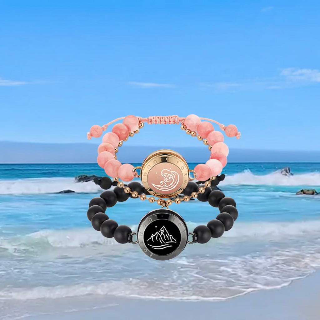 Planet Beaded Bracelet pair with rose and black natural-stone beads set against a beach and ocean backdrop