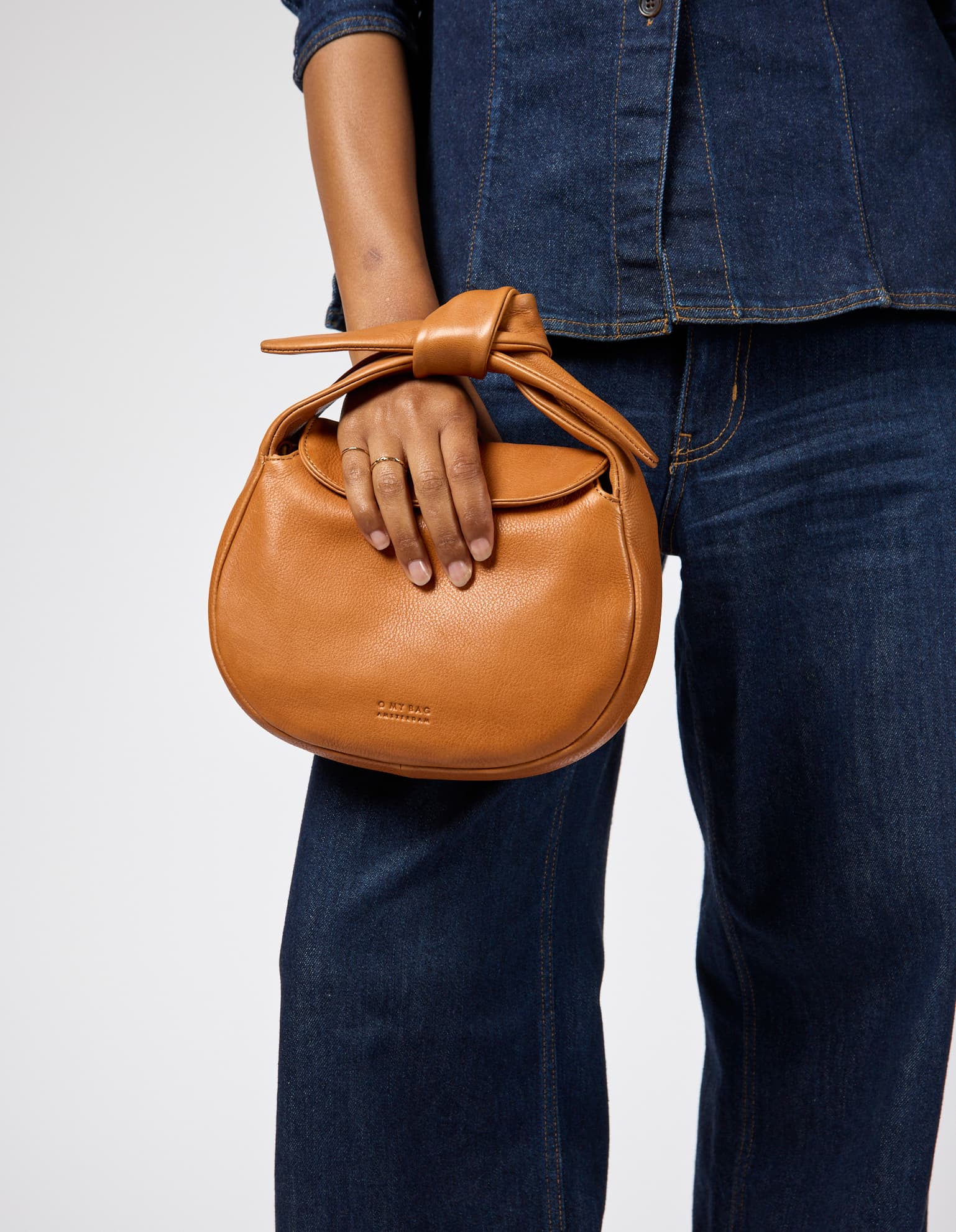 Model wearing Coco bag in Wild Oak color