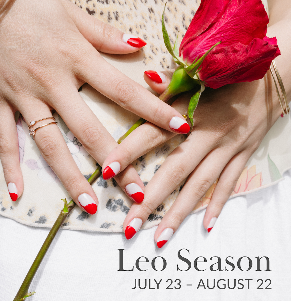 Hands with red and white nail art holding a red rose. Text reads, "Leo Season, July 23–August 22."