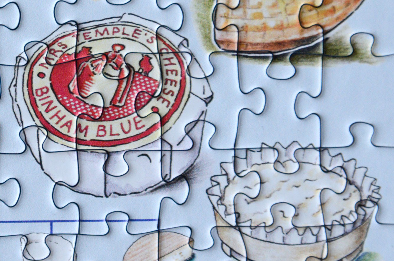 A cheesemongers Map of Britain and Ireland Cheeses 1000 piece jigsaw puzzle