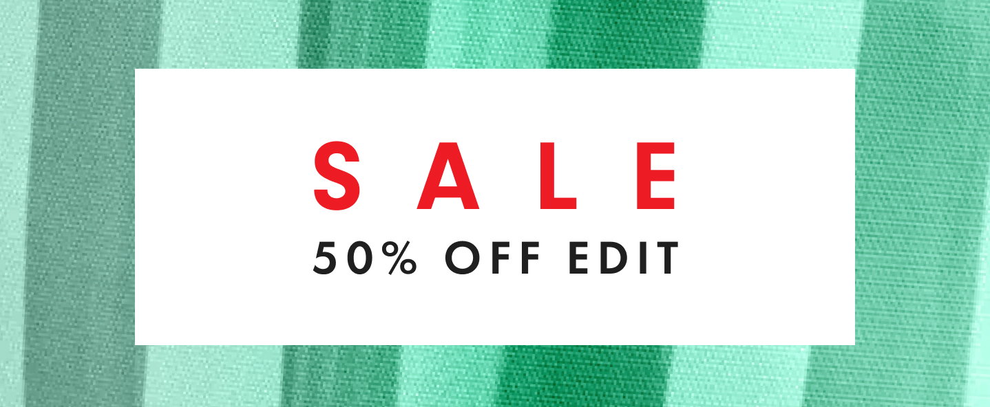 Sale – 50% Off Edit, on a green striped fabric background