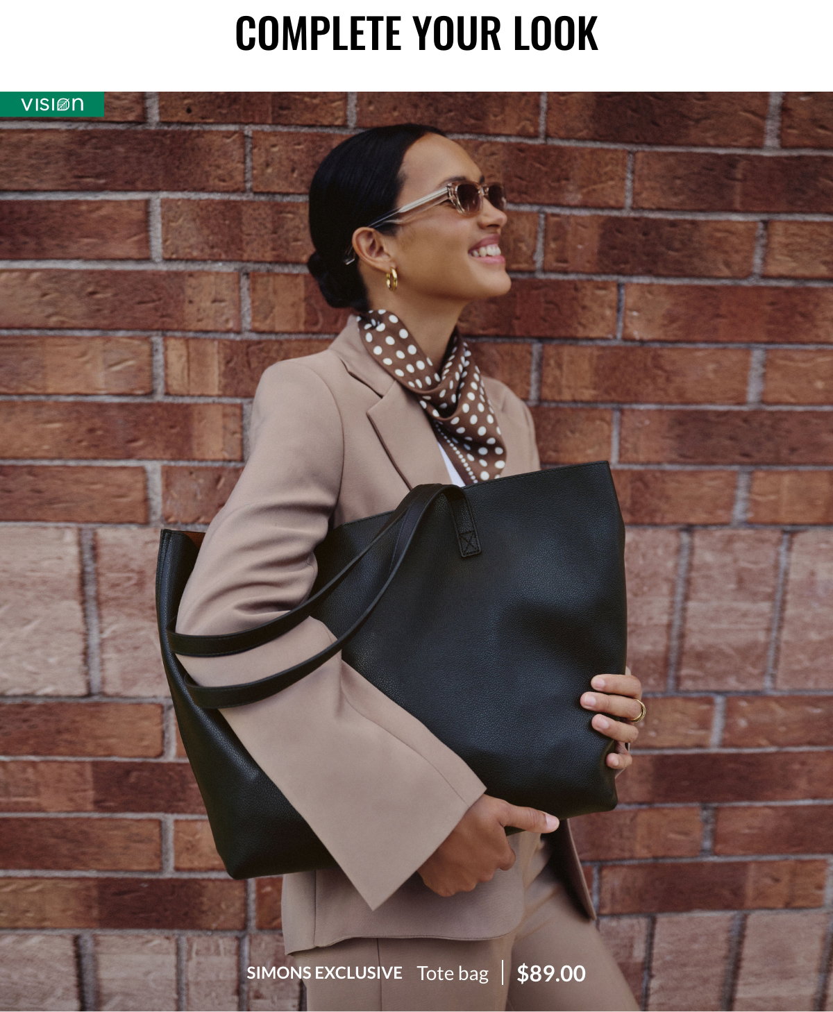 Complete You Look. Woman wearing a black faux-leather tote bag 89 $.