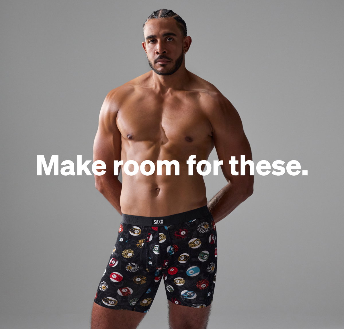 Model rwearing striped boxer briefs with the headline “Make room for these” showcasing a modern fit and everyday comfort.