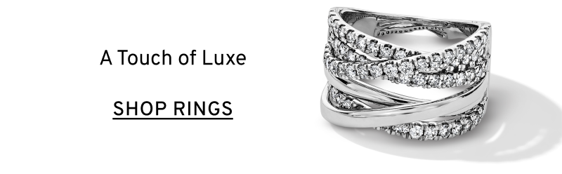 Stack of white gold and diamond rings. A touch of luxe. Click to Shop Diamond Rings