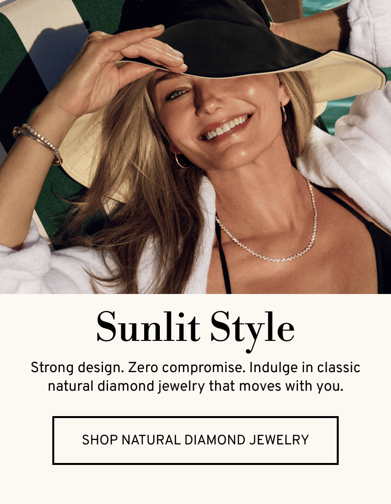 Model basking in the sun wearing diamond jewelry. Sunlit style. Click to Shop Natural Diamond Jewelry