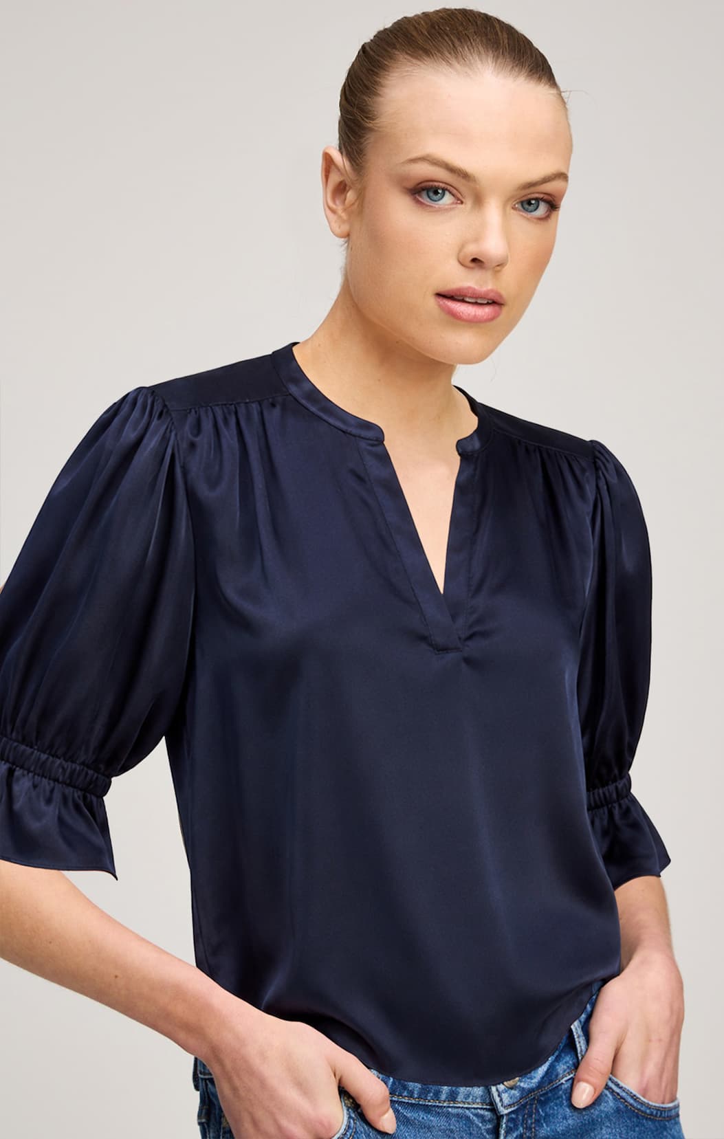 https://cinqasept.nyc/products/split-neck-fiona-top-in-navy